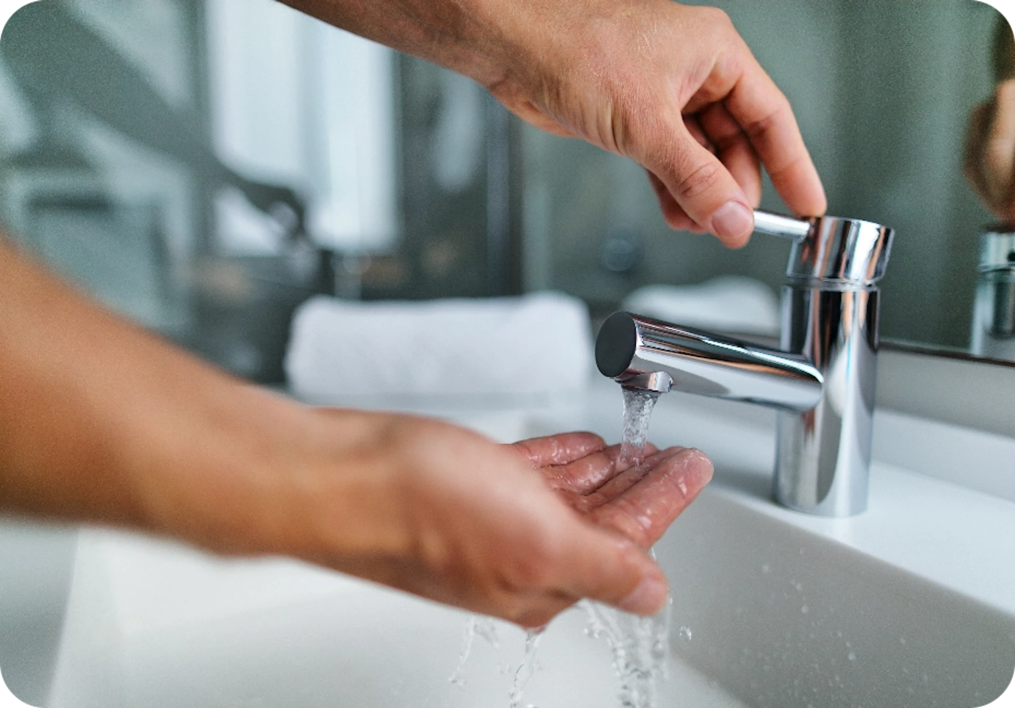 washing of hands from tap