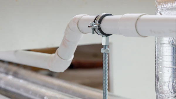 brymec white solvent weld waste pipe and fittings installed
