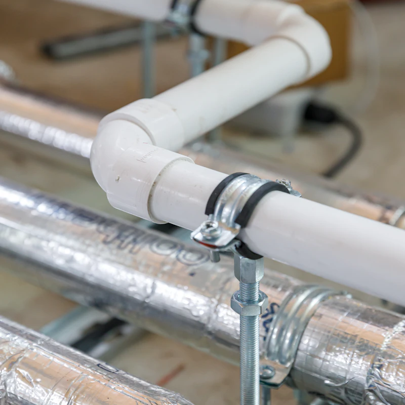 brymec white solvent weld waste pipe and fittings installed