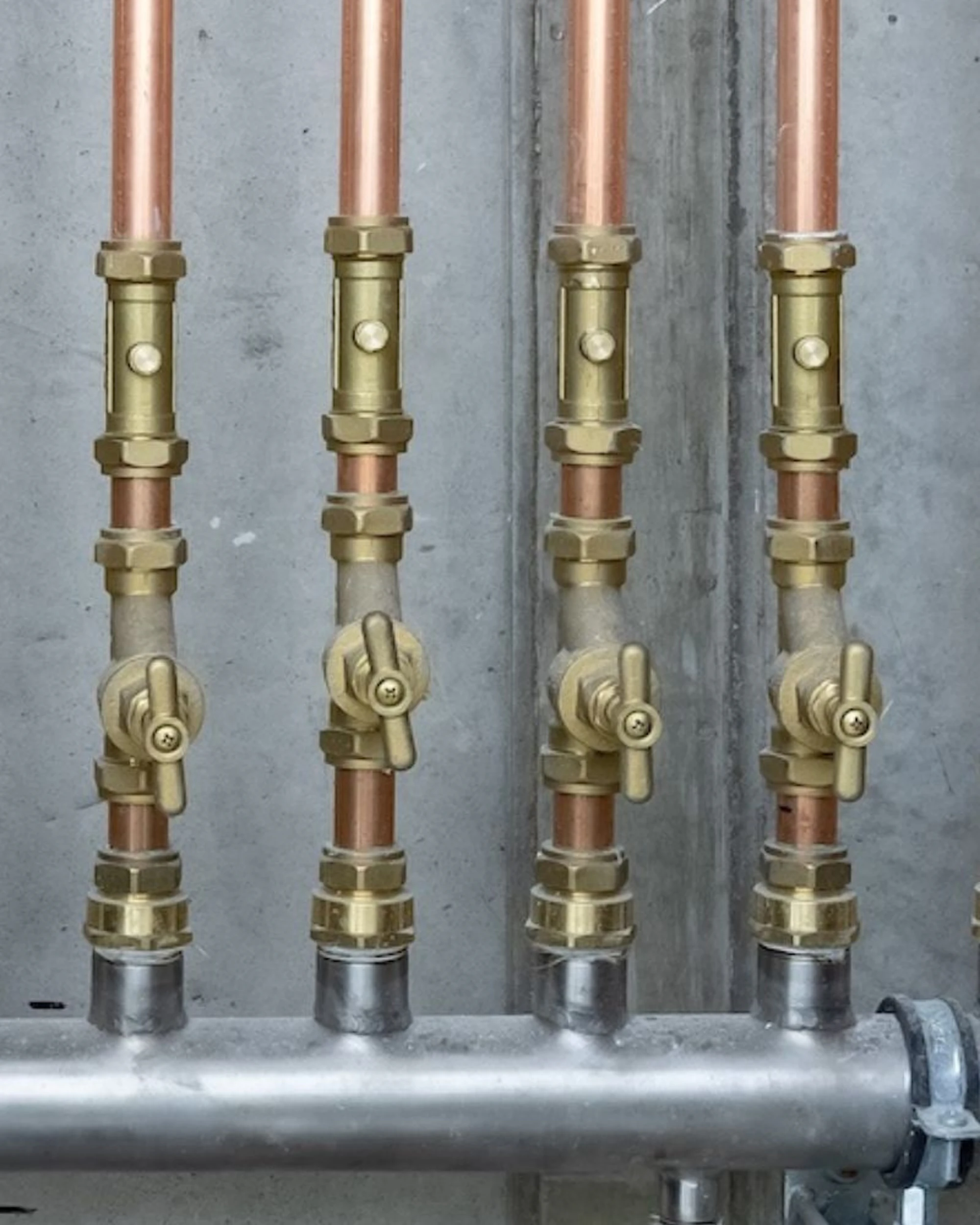 brymec brass compression fittings installed with copper pipe